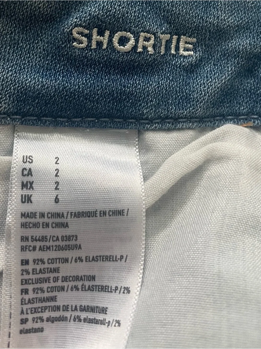 American Eagle Outfitters Light Blue Lace-Up Distressed Denim Shorts
